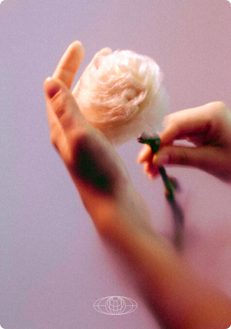 woman posing with her hands, there's a reddish gradient map applied - image by klara-kulikova